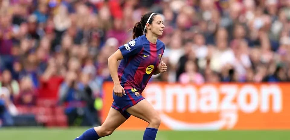 Player running on field during match at Camp Nou