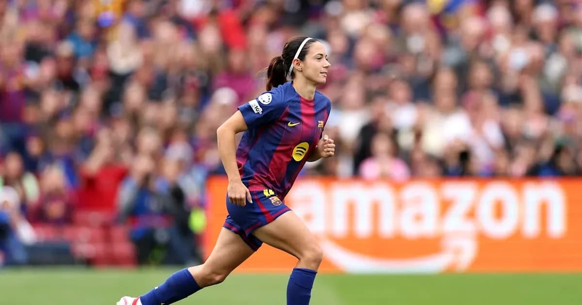 Player running on field during match at Camp Nou