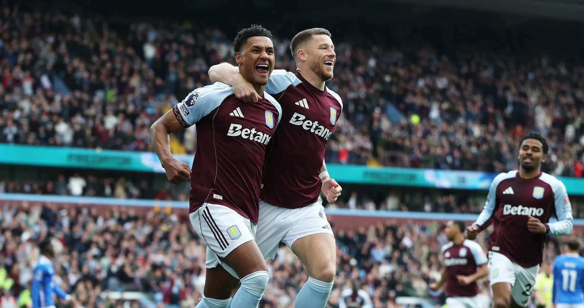 Aston Villa players celebrating a goal during match