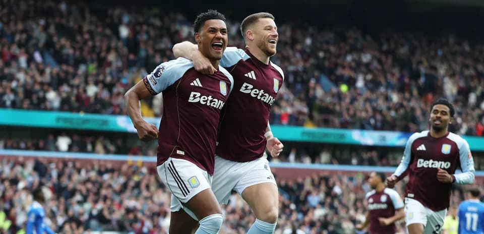 Aston Villa players celebrating a goal during match