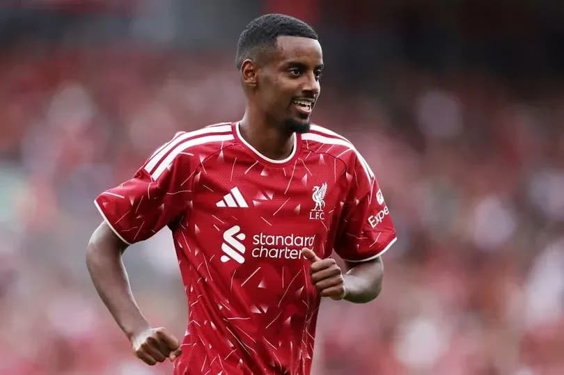 Player celebrating during Liverpool FC match
