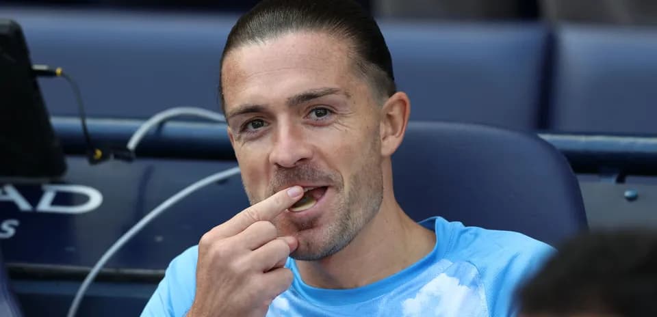 Player eating snack on bench during match