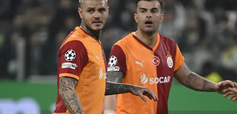 Two Galatasaray players in UEFA match action