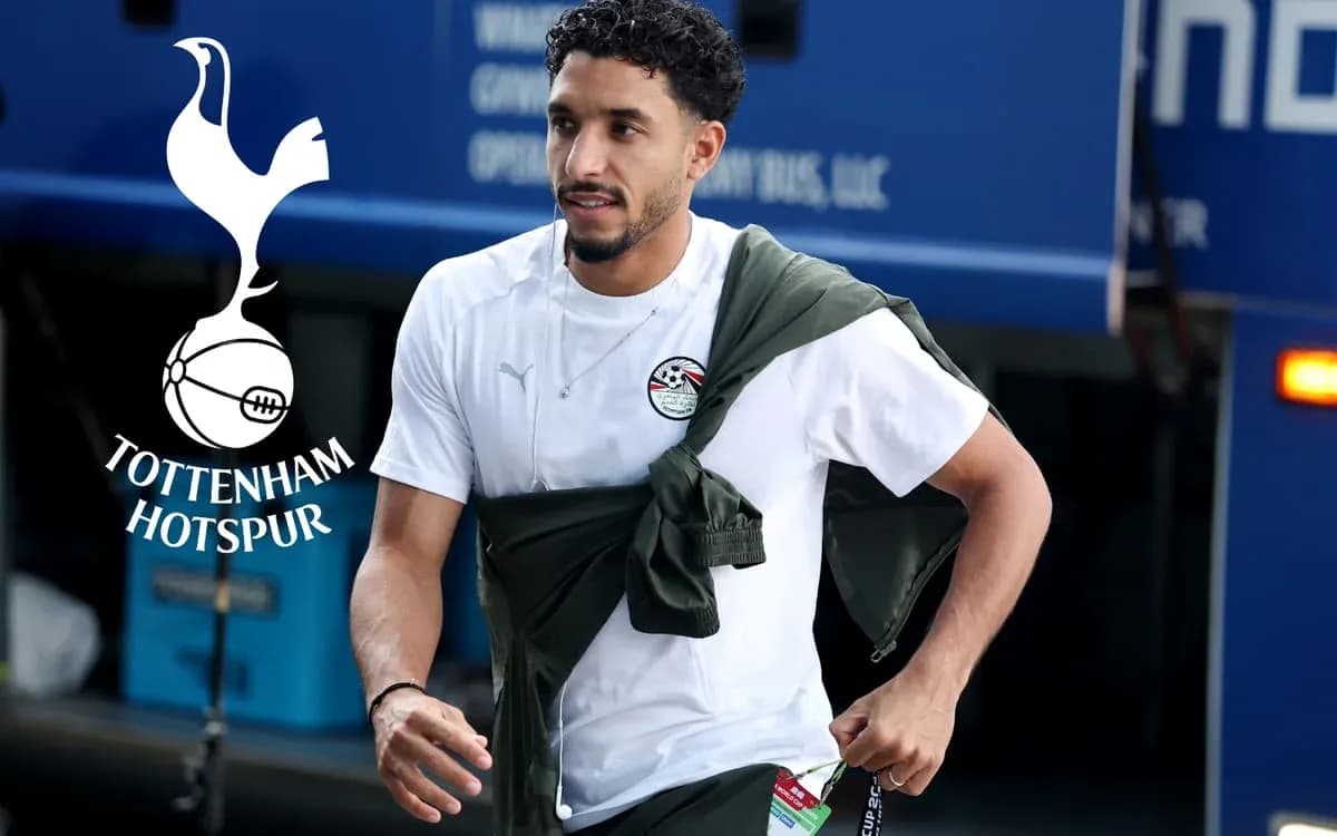 Player walking towards team bus in training gear