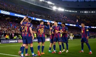 Barcelona players celebrating a goal during match