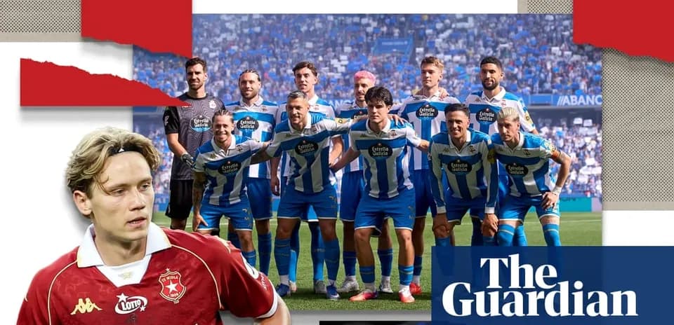 Football team posing together before a match