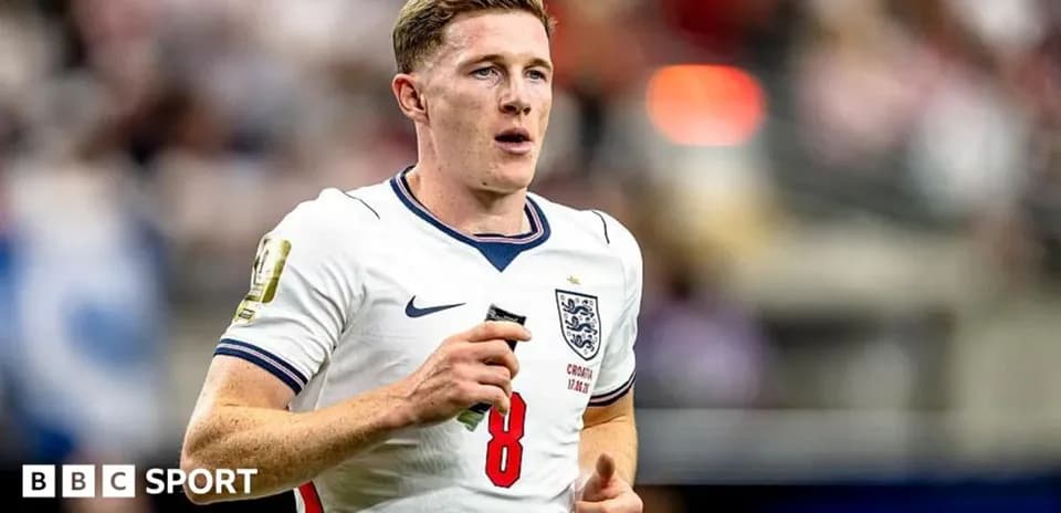 England player running during match in white jersey