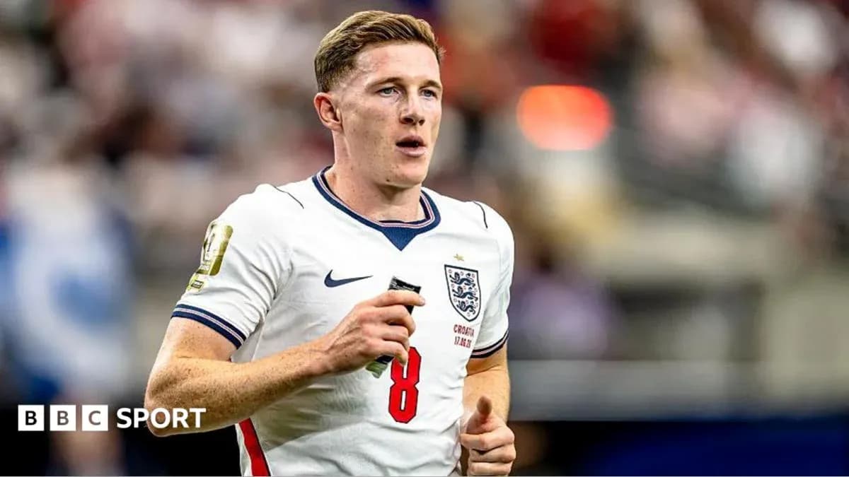 England player running during match in white jersey