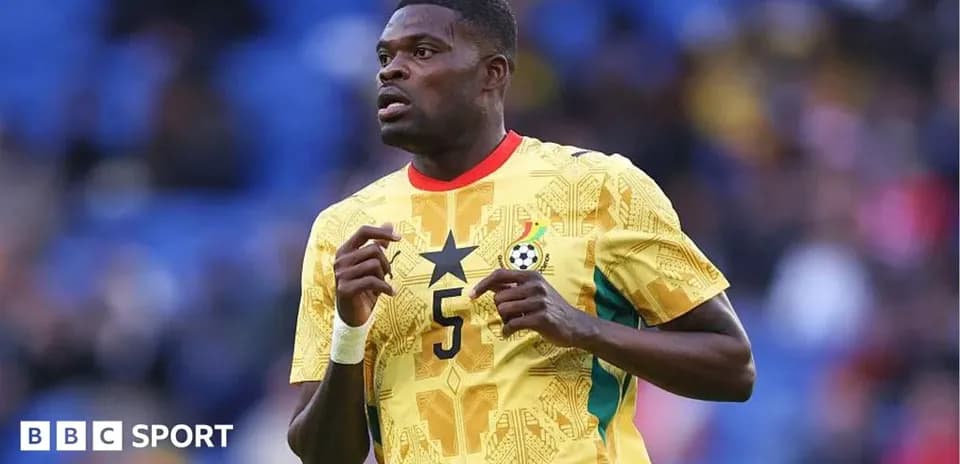 Player wearing Ghana jersey during match action