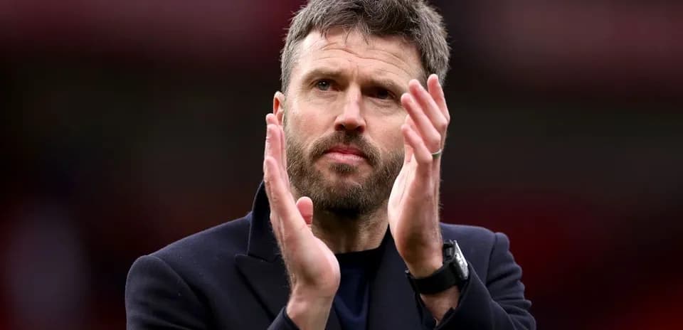 Coach applauding fans after the match