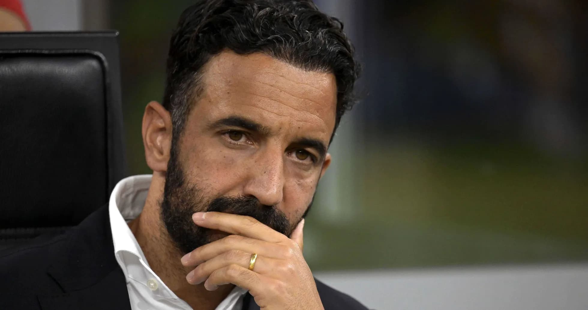 Coach deep in thought during match observation