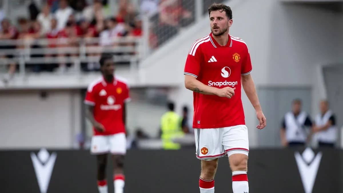 Manchester United player walking on the field