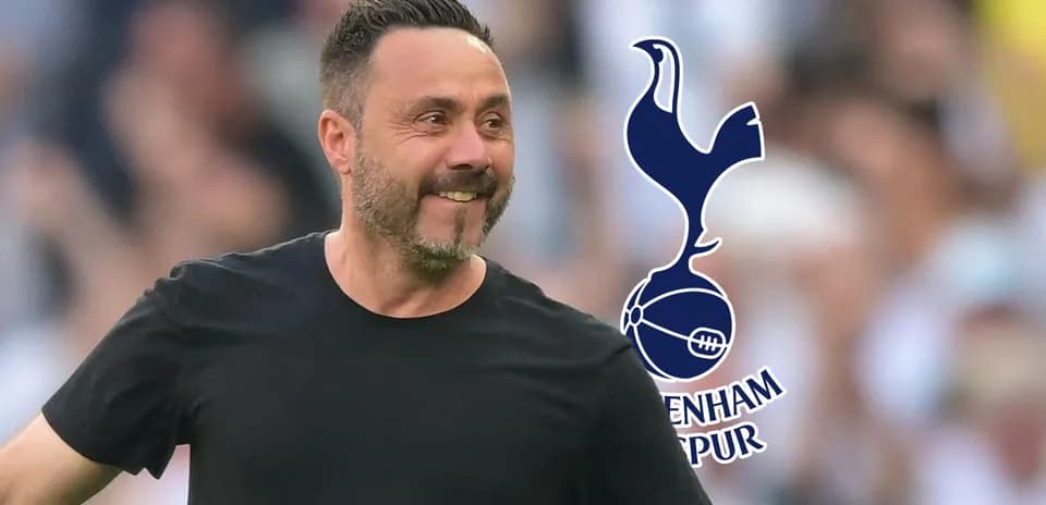 Manager celebrating with Tottenham Hotspur logo