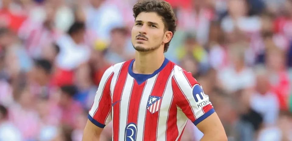 Player in Atlético Madrid jersey during match