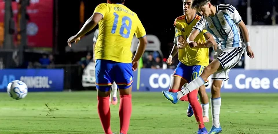 Argentinian player kicking the ball during match
