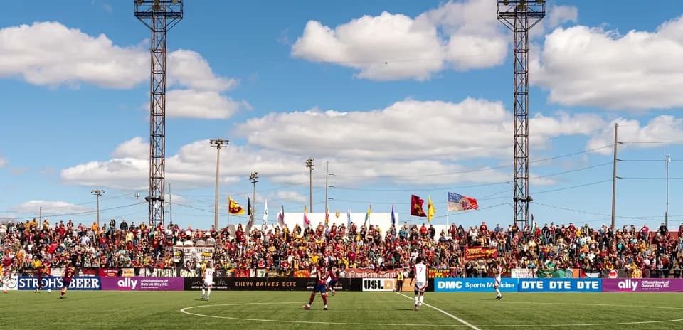 Crowd cheering during Detroit City match
