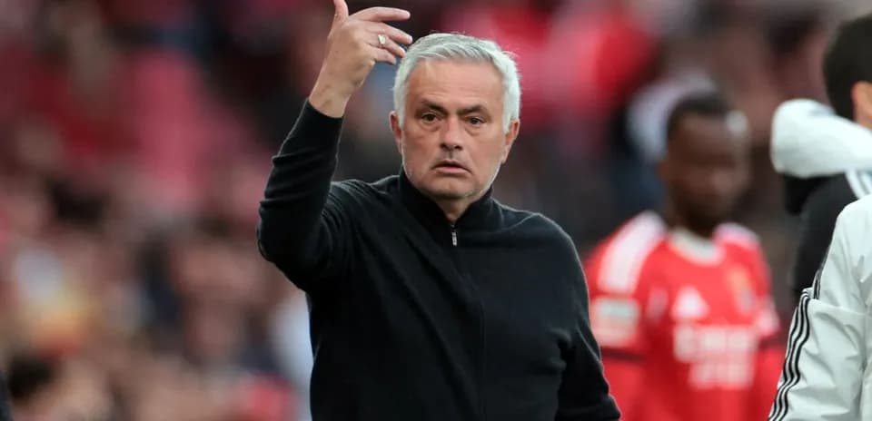 Manager gesturing during a football match