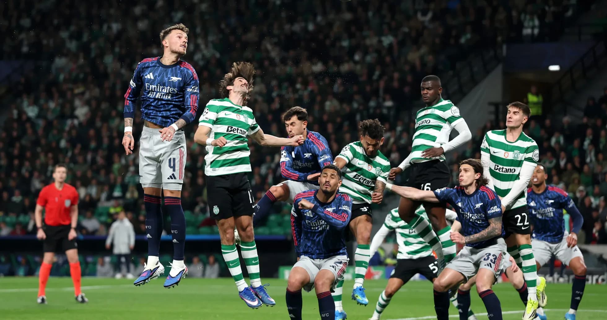 Players contesting a high ball during match