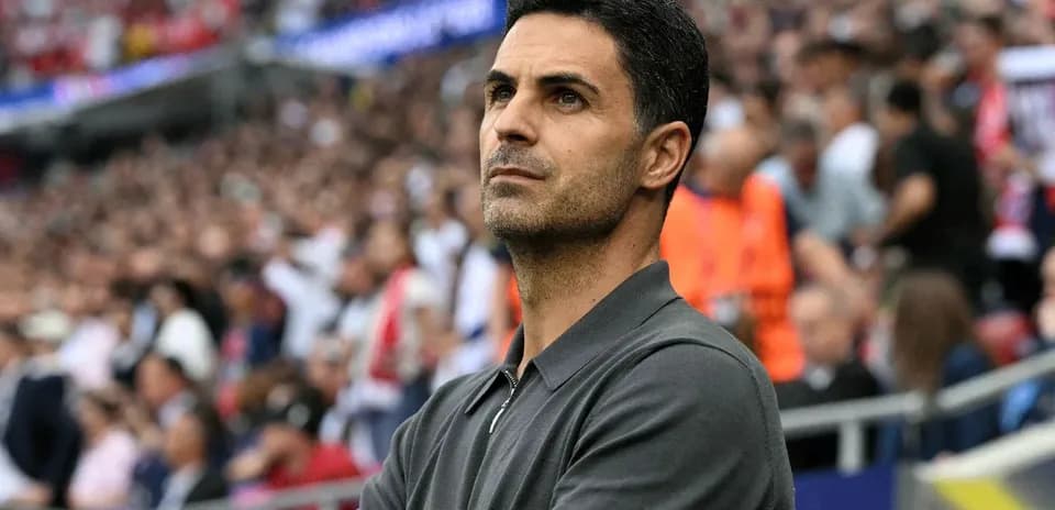 Coach observing the match from the sidelines