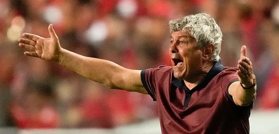 Coach gesturing and shouting during match