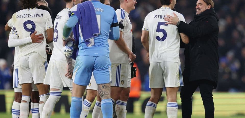 Leeds players celebrating a goal against Chelsea.