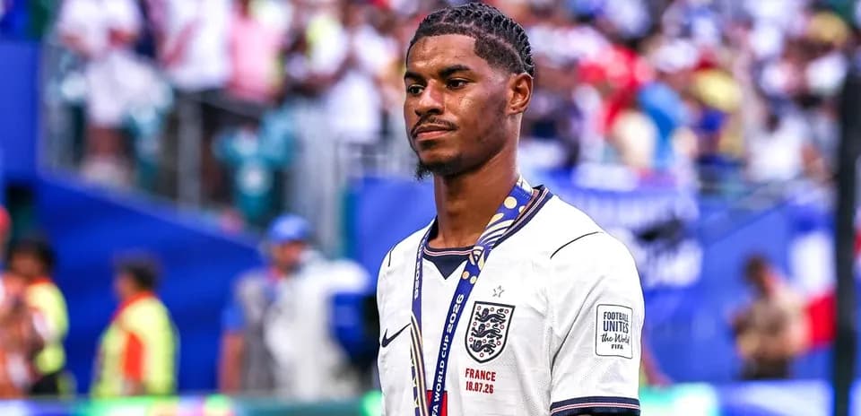 Player wearing England jersey at stadium after match