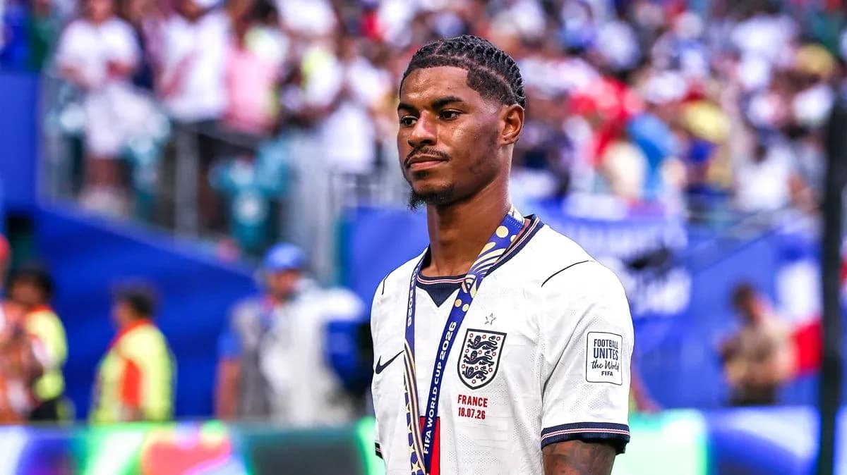 Player wearing England jersey at stadium after match