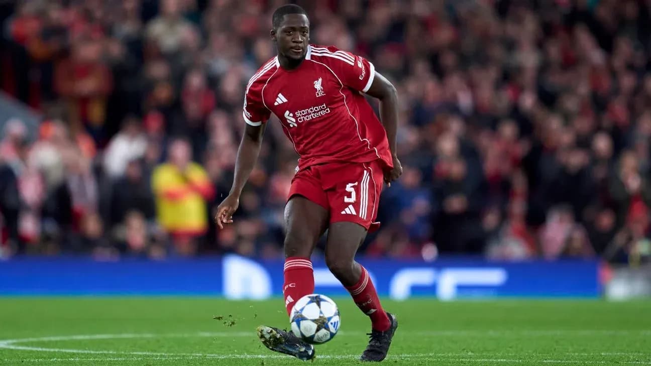 Liverpool player dribbling ball during match