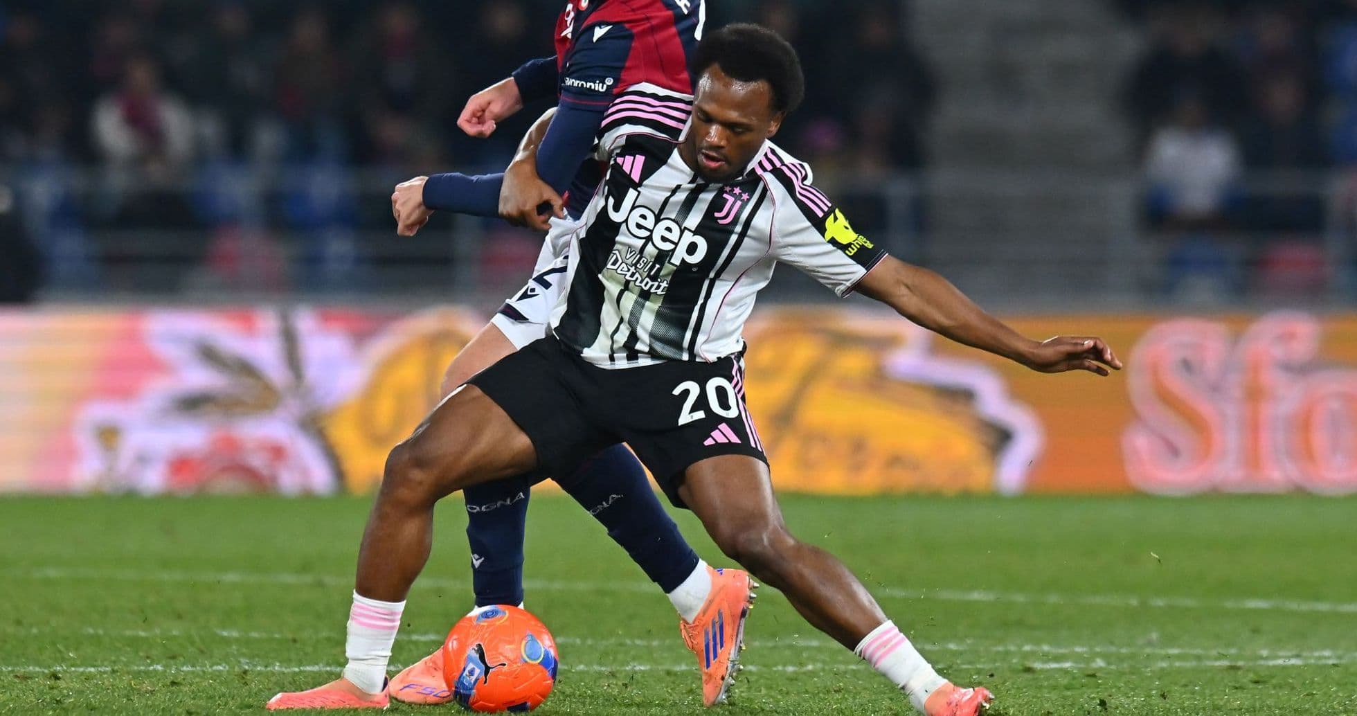 Player from Juventus tackling opponent during match