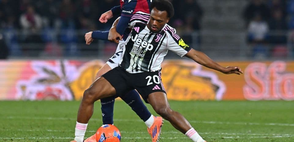 Player from Juventus tackling opponent during match
