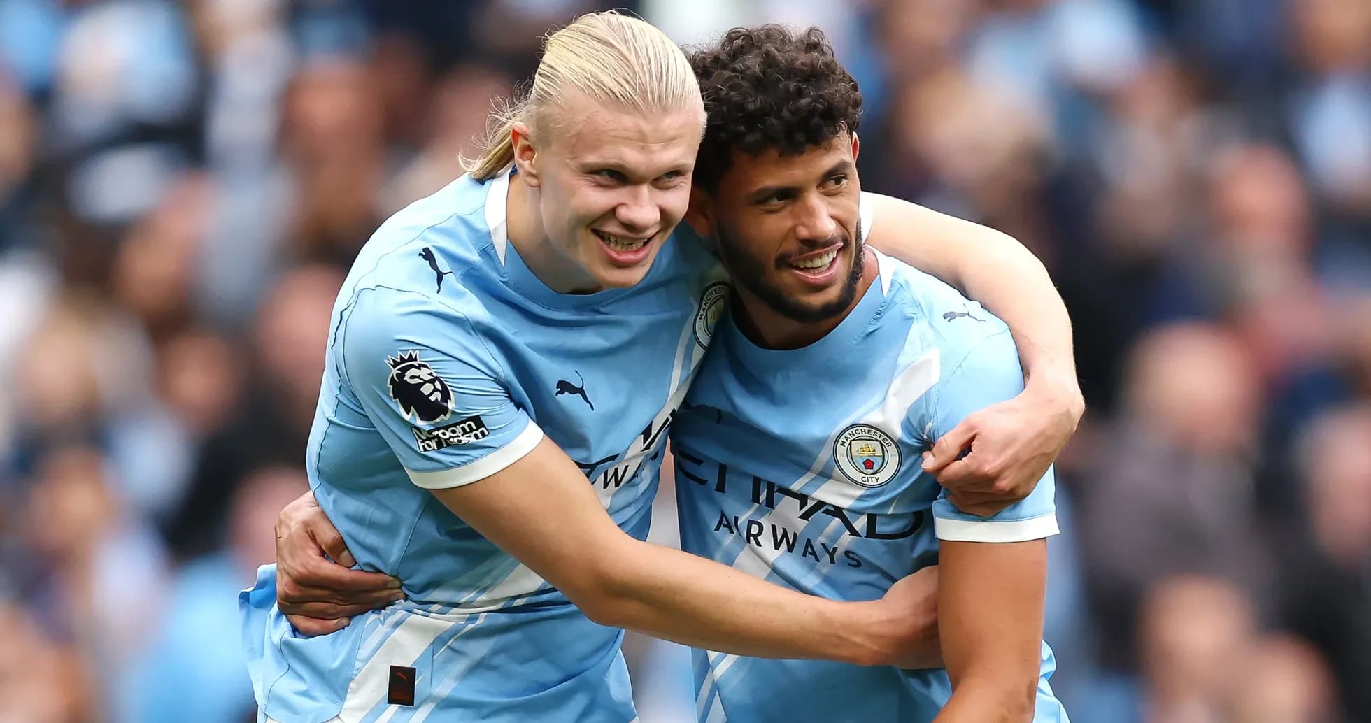 Manchester City players celebrating a goal