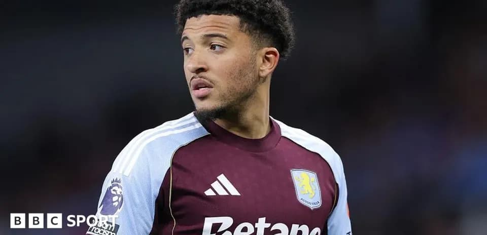 Football player in Aston Villa kit during match