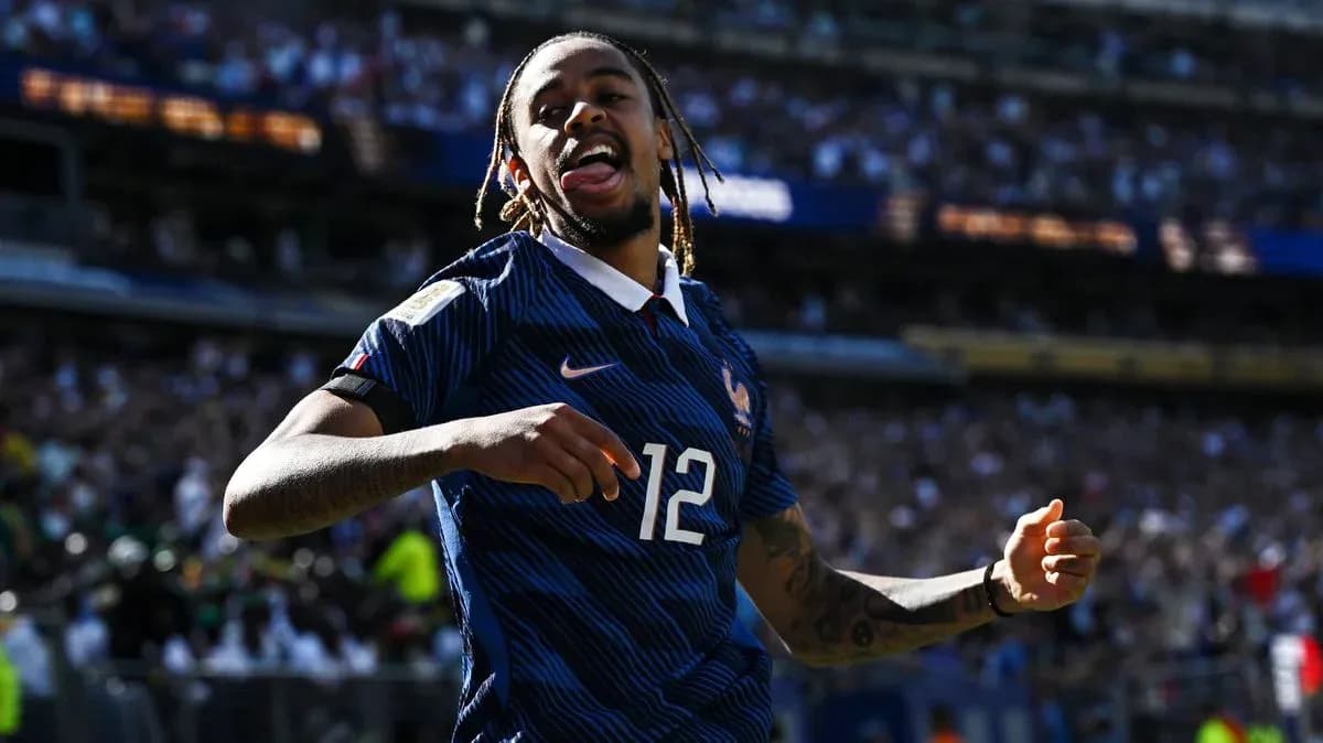 Player celebrating during match with crowd in background