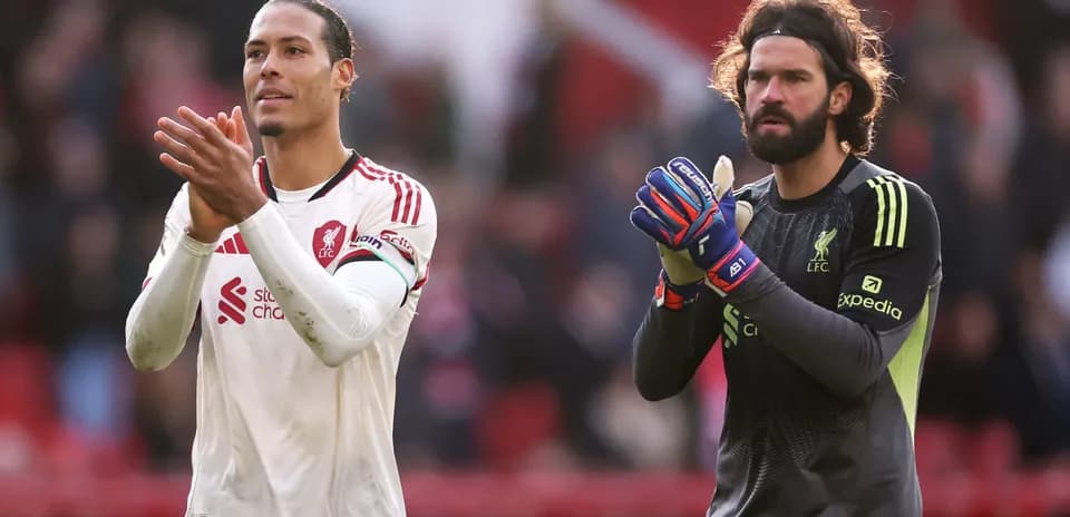 Liverpool players applauding after match