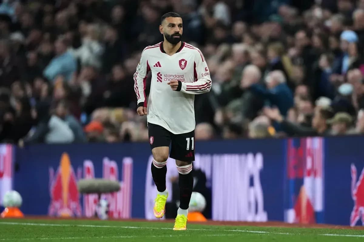 Player in Liverpool kit running on the pitch