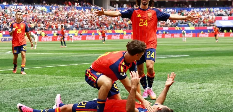 Spain players celebrating a goal during match