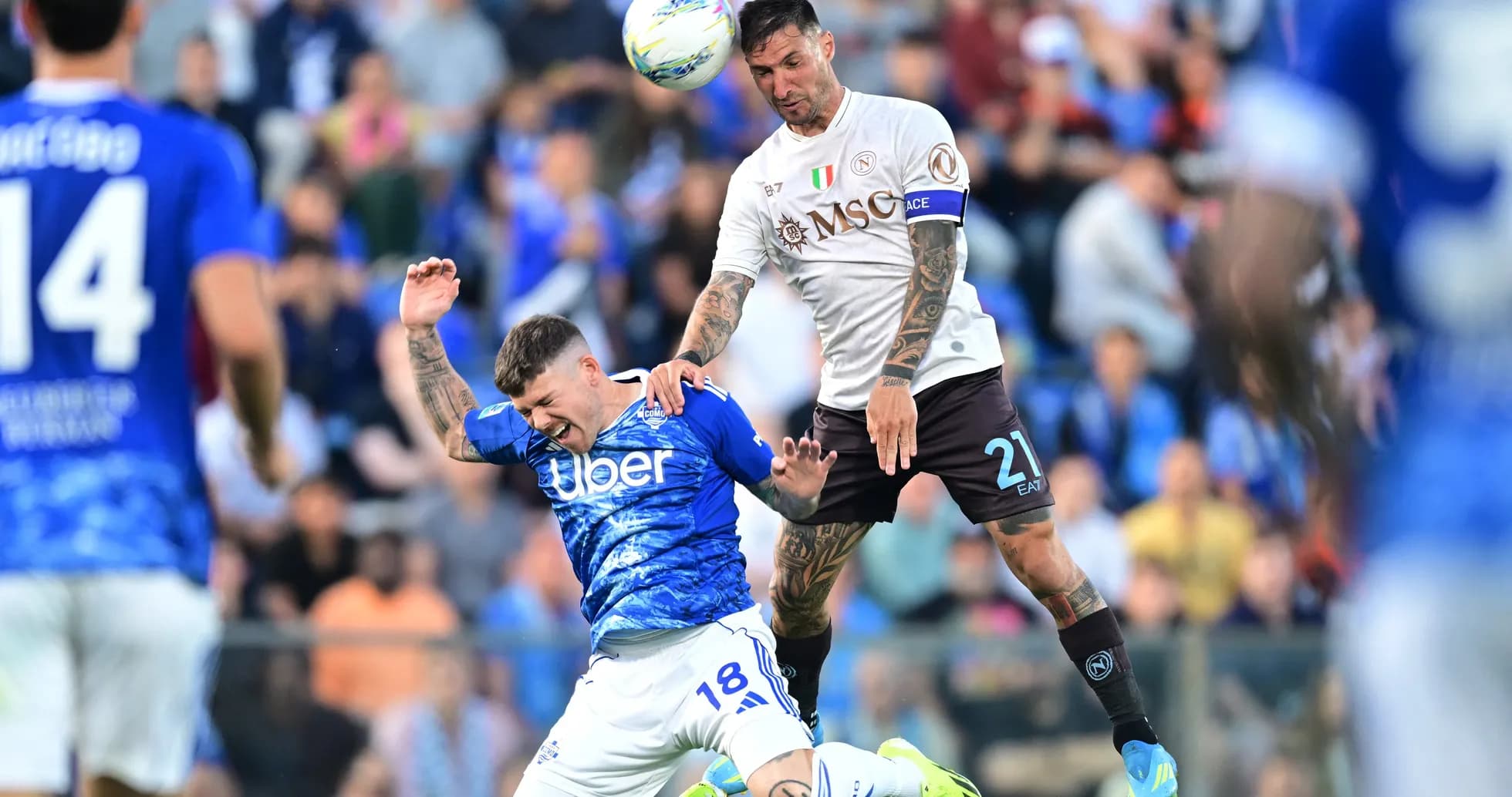 Napoli player contesting the ball against Como