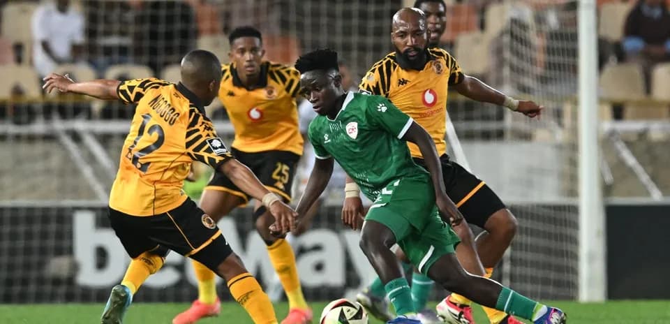 Players competing for the ball during a soccer match