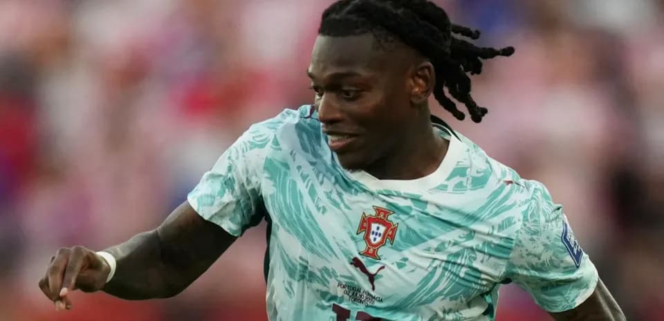 Player in Portugal kit running on the field