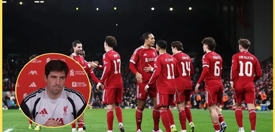 Liverpool players celebrating together on the pitch