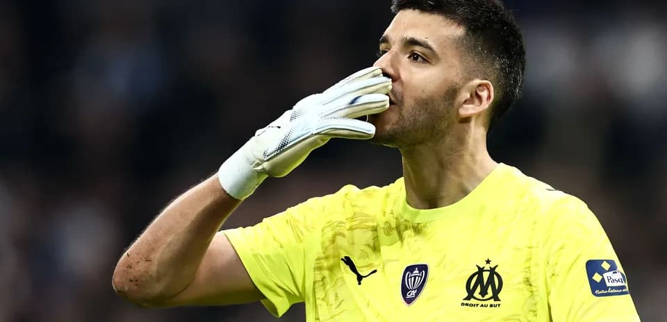 Goalkeeper gesturing during match in yellow uniform