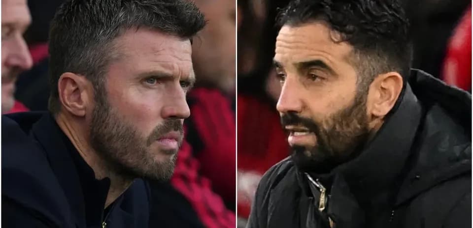 Two football managers on the sidelines during a match