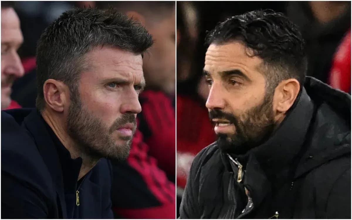 Two football managers on the sidelines during a match