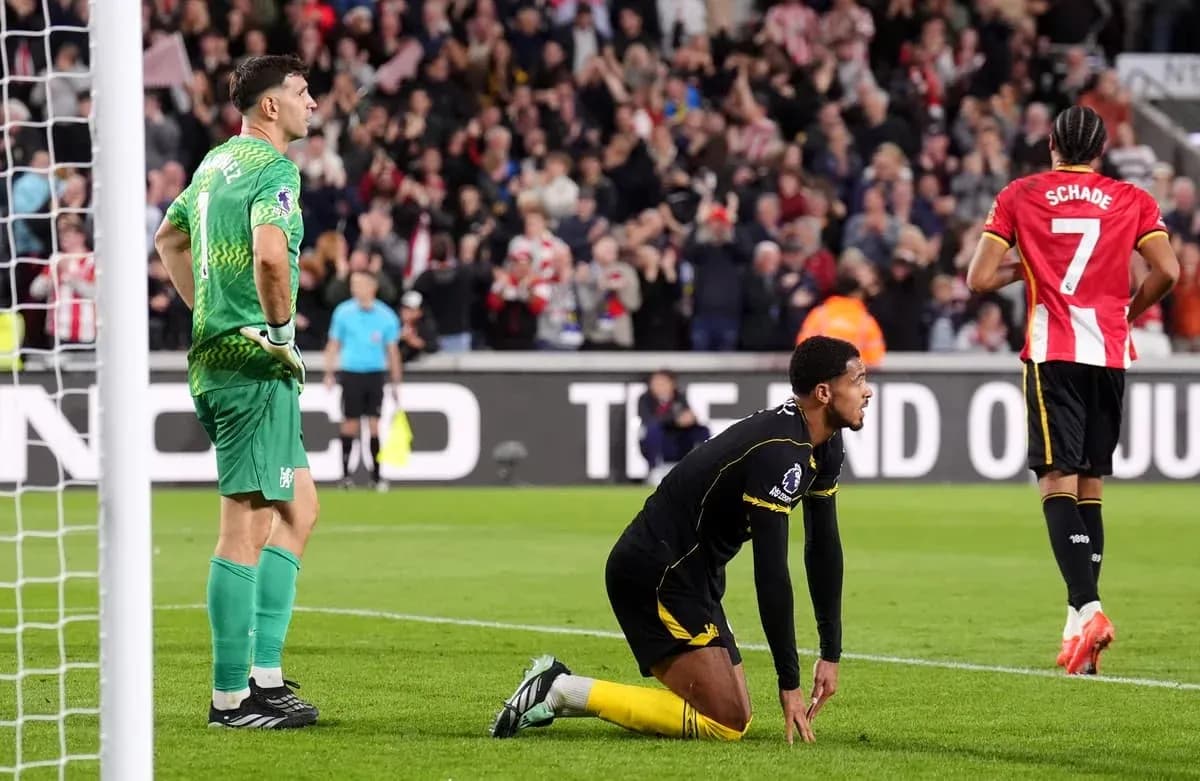 Goalkeeper and players reacting after a goal scored