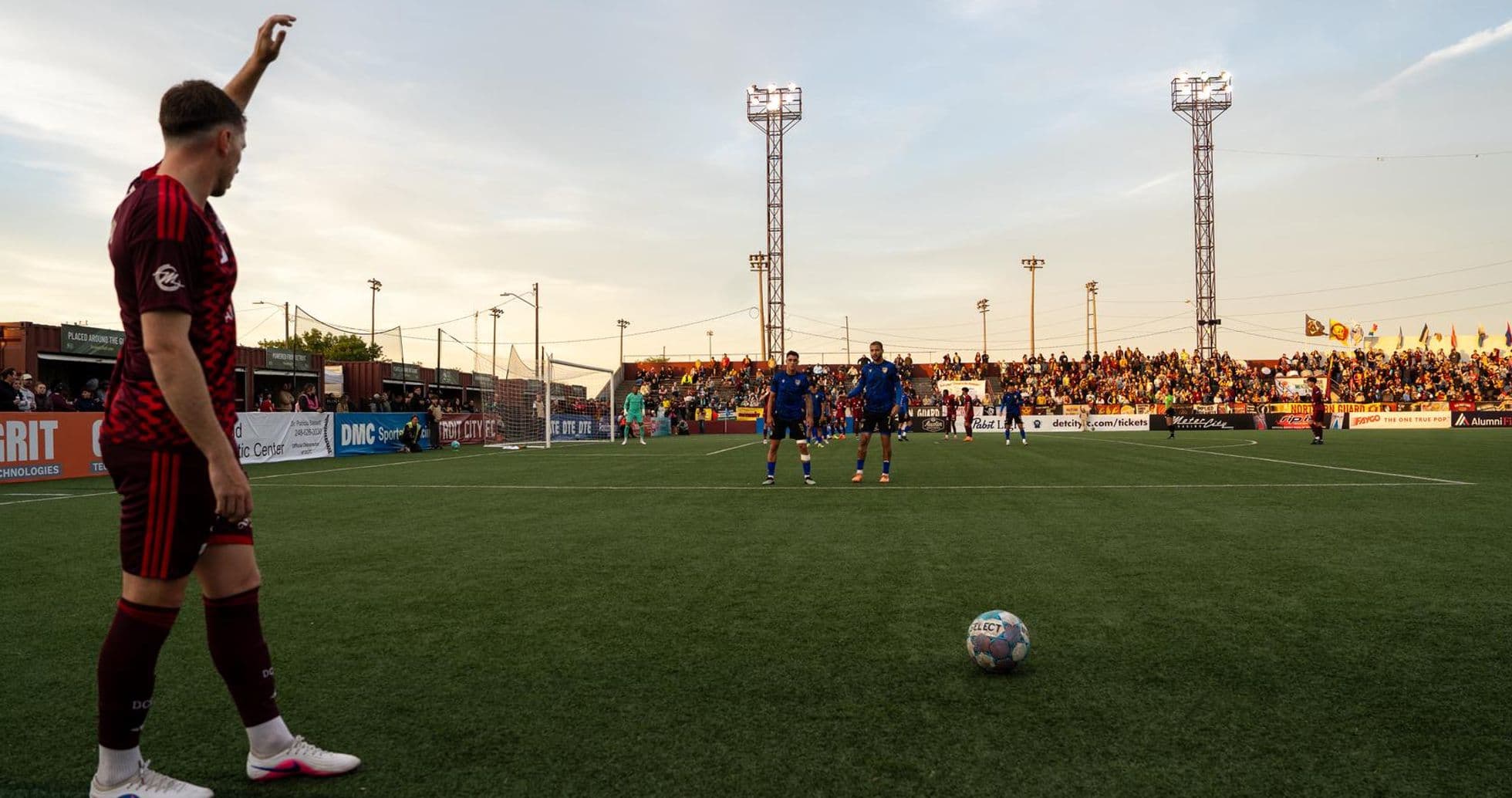Player preparing for a free kick during match