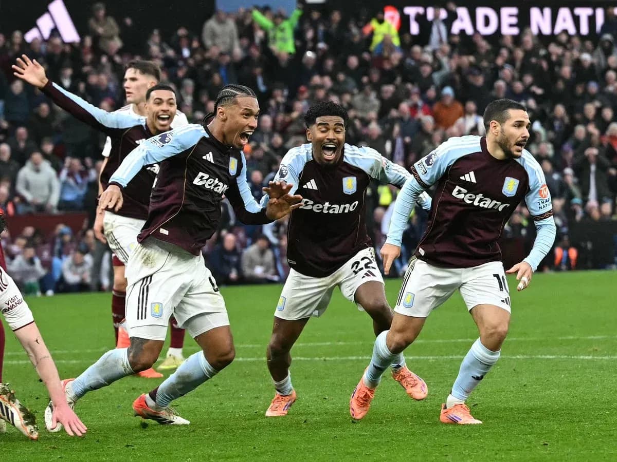 Aston Villa players celebrating a goal during match