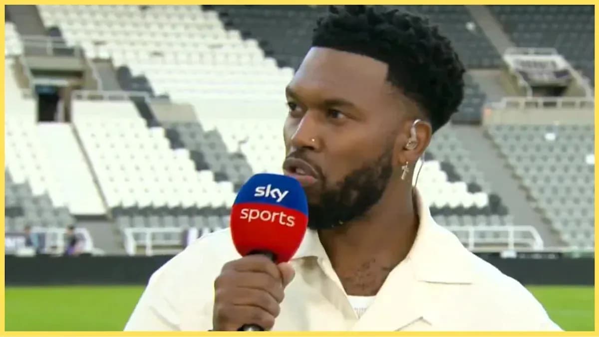 Sports commentator speaking with microphone on field
