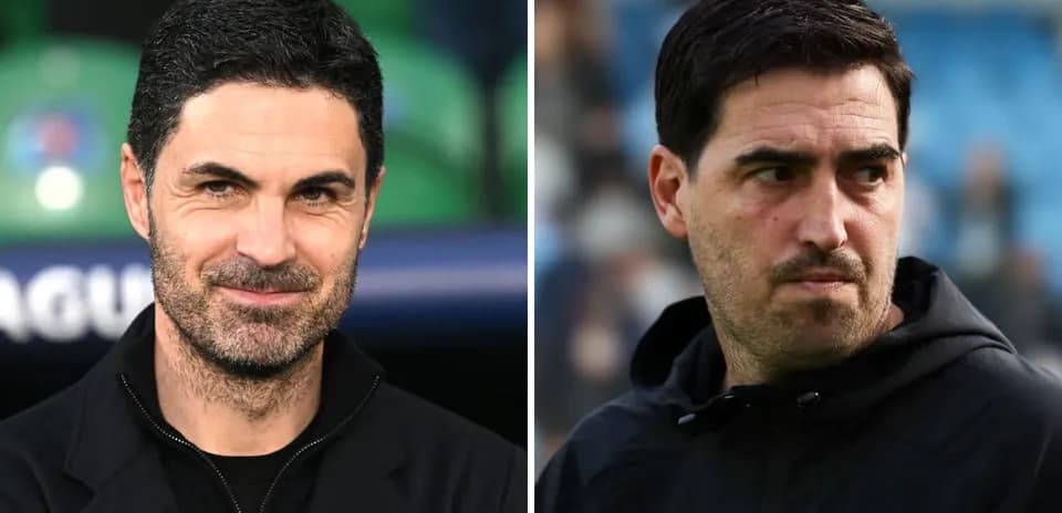 Two football managers on the sidelines during a match
