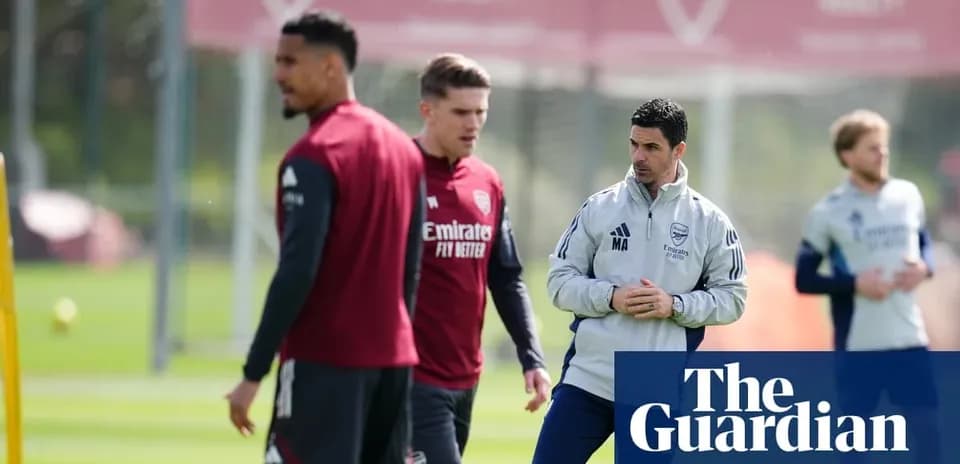 Arsenal players training with manager at practice session