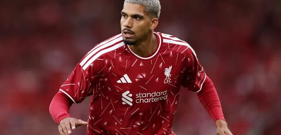 Player in red Liverpool kit during match
